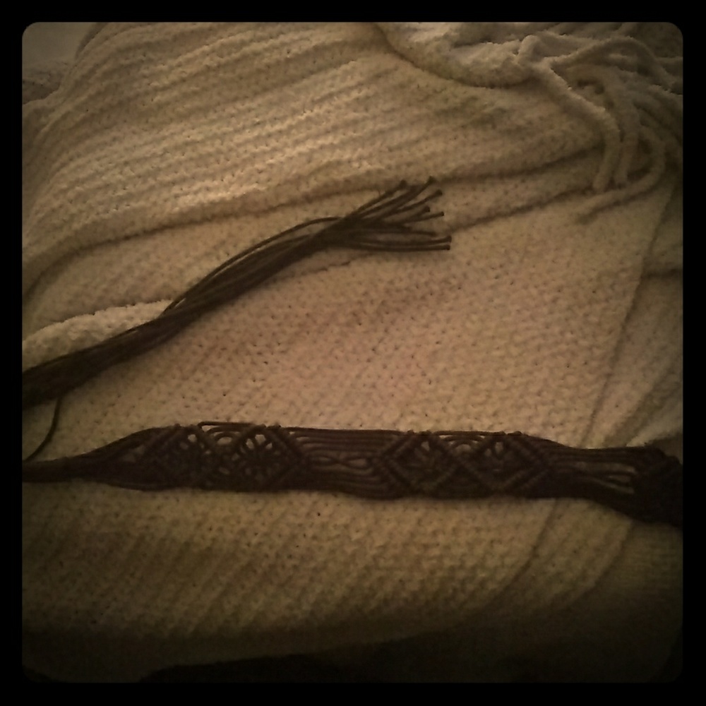 Braided benders of brown sash leather art piece